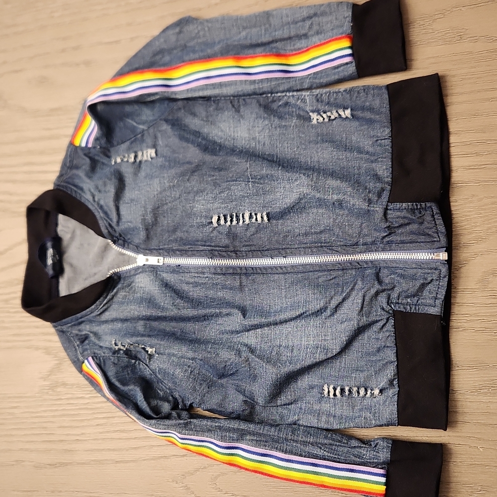 Lightweight girls denim jacket with rainbow ribbons on sleeves